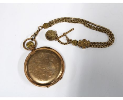 A 9ct gold Hunter pocket watch by Thos. Russell, the signed enamel dial with roman numerals and railroad outer seconds track 