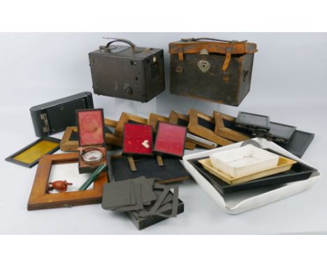 A late Victorian quarter plate camera, with Bausch and Lomb lens patented 6th January 1891 in leather covered mahogany case 2