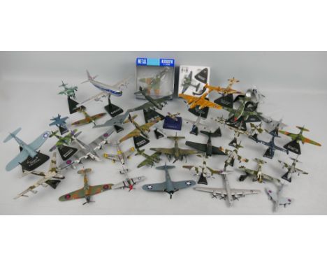 Various makers - large quantity of predominantly die-cast model aeroplanes, some by Corgi, some with stands