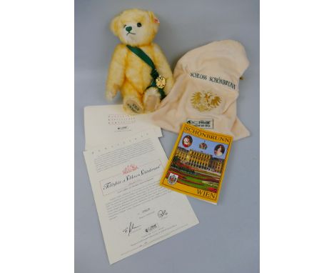 A Steiff "Schloss Schonbrunn" teddy bear, limited edition number 610/1500 in original bag with certificate and related book, 