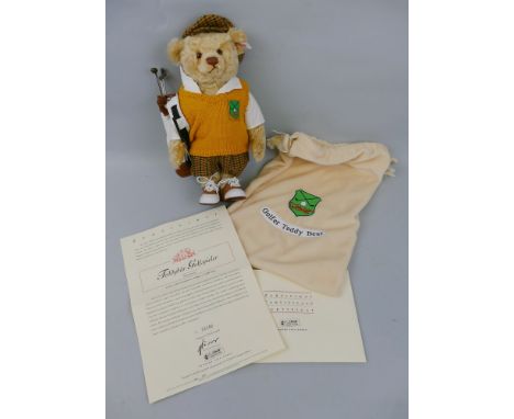 A Steiff Golfer teddy bear, limited edition number 1182/3000, in original bag with certificate, 32cm high