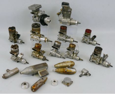 A collection of eleven model aircraft engines of various sizes, British and Japanese, and a quantity of exhausts