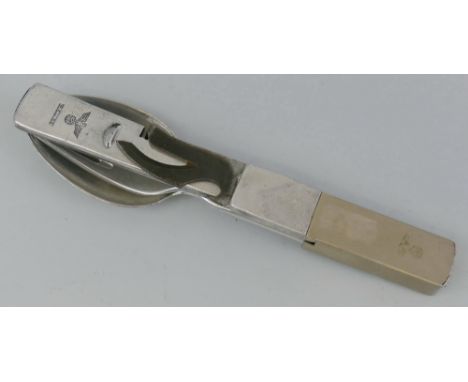 A WWII German white metal combination knife, fork and spoon set, stamped with Wermacht eagle and W.A.L.43 19cm long