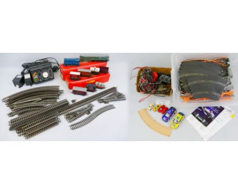 A quantity of Scalextric including two cars, track and accessories, a quantity of Minic Motorways racing track with four cars