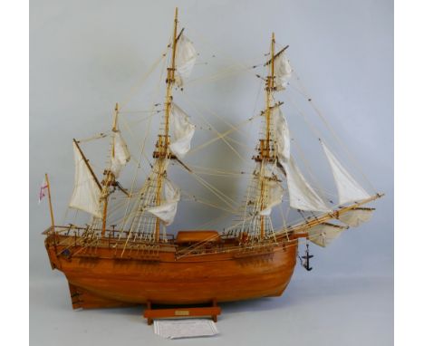 A wooden model of Captain Cook's sailing ship The Endeavour, with teak hull, deck and fittings and linen sails with rigging, 