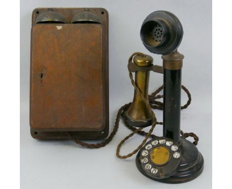 A black japanned steel and brass candlestick telephone, 31cm with mahogany cased bell box (2)