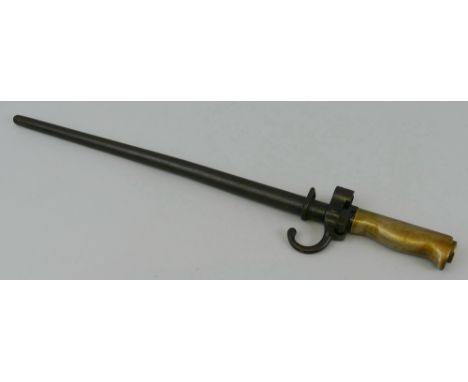 A 19th century French Lebel 1888 pattern bayonet, short version with 34cm steel cruciform blade and steel tapering circular s