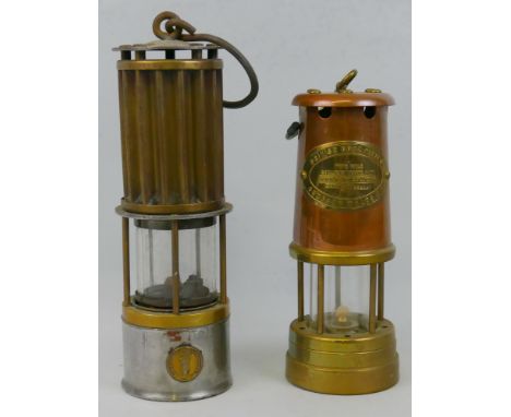 A miner's brass and steel safety lamp,  bearing plaque for "The Premier Lamp and Engineering Co Ltd Leeds" of typical form wi