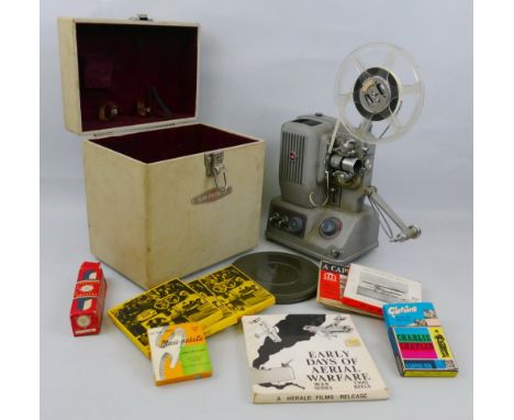 Elmo 8mm Projector Model E-80, with carrying case and ten various films including aviation history, Charlie Chaplin etc