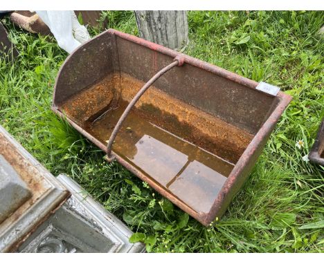 Small antique cast iron feeding trough