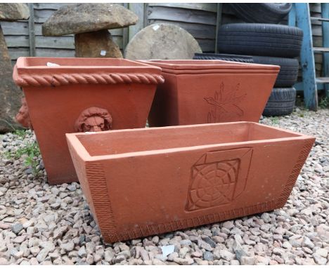 2 terracotta planters together with a terracotta trough planter 