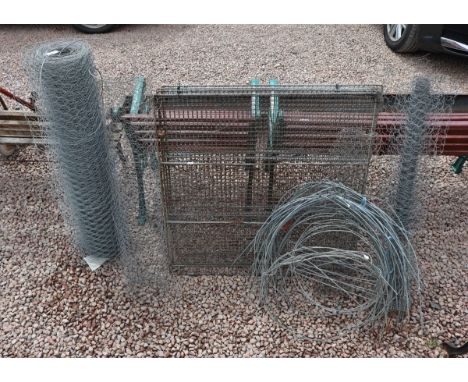 Rolls of rabbit/chicken wire approx 50 m together with a galvanised mesh stock pen and a quantity of metal cloche frames and 