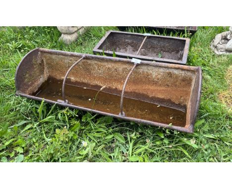 Antique cast iron feeding trough