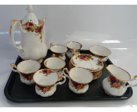 Royal Albert Old Country Roses part tea service, comprising teapot, cups and saucers with milk jug.