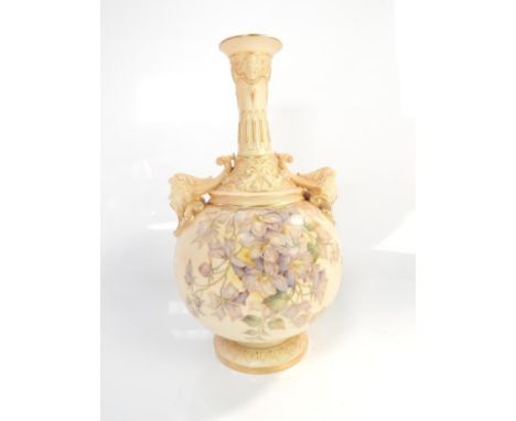 A Royal Worcester blush ivory baluster vase, with gilt adornments and floriate decoration, model no. 1552, 26cm high.