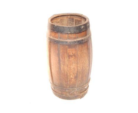 A coopered barrel fashioned into a stick stand, 67cm high.