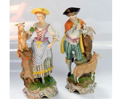 Two Dresden figures, of 18thC style man and woman with sheep upon countryside plinth, both 21cm high.