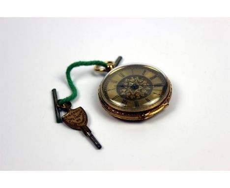 A Victorian floral chased open face pocket watch, with engine turned and piquet work dial, yellow metal, stamped 18K.