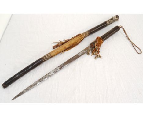 AFRICAN SWORD
with a tapering steel blade marked The Gondola Brand, with a tooled leather handle and scabbard with tassels, b