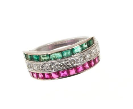 Diamond, ruby and emerald triple row ring, the wide band with a half hoop of brilliant cut diamonds flanked by a line of cali