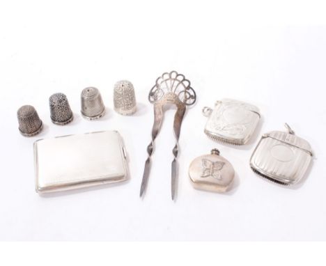 Selection of miscellaneous early 20th century silver and white metal including four thimbles, two vesta cases, book match hol