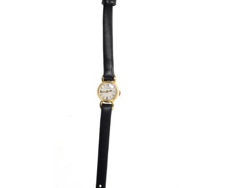 Lady’s Jaeger-LeCoultre gold wristwatch with circular dial, applied gold baton and Arabic numerals, concealed winding crown i
