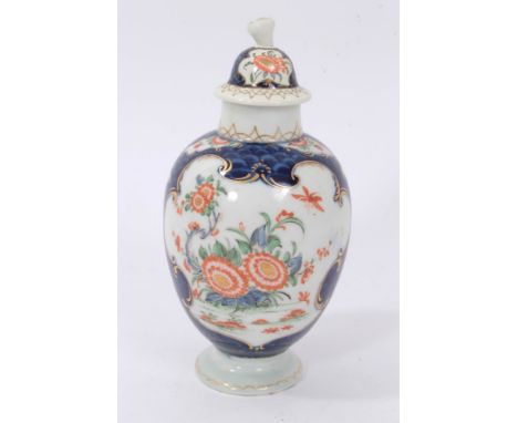 Late 18th century Worcester tea caddy, decorated in polychrome enamels with floral patterns inside scrollwork cartouches, on 