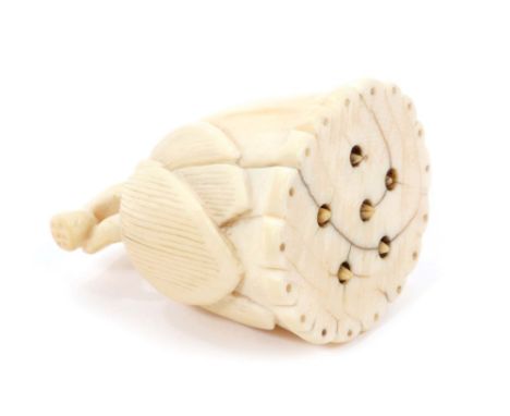 Unusual Edo period Japanese carved ivory netsuke, in the form of an inverted lotus flower, with retractable stamen, 5cm high
