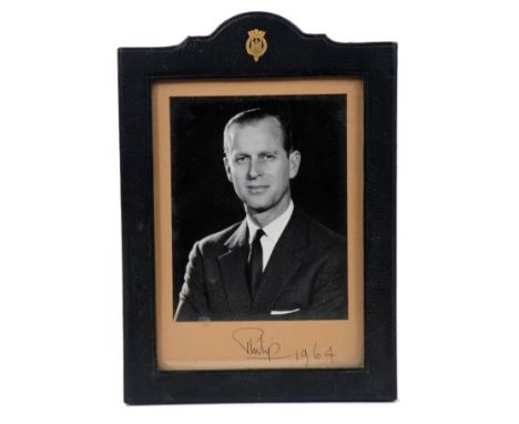 HRH Prince Philip Duke of Edinburgh, signed presentation portrait photograph of The prince wearing a lounge suit, signed in i