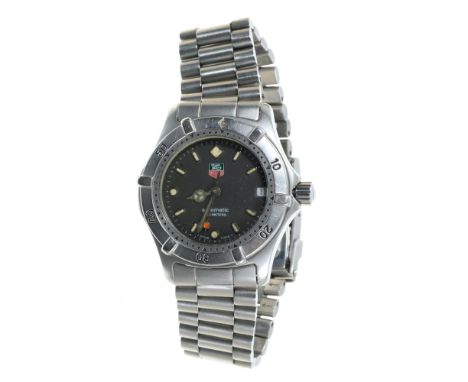Tag Heuer Automatic stainless steel wristwatch with rotating bezel, graphite grey dial with centre sweep seconds and date ape