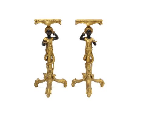 Pair of 18th century Venetian style gilt and polychrome blackamoor torcheres, each with rectangular top on figural column and