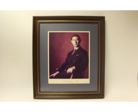 HRH Prince Charles Prince of Wales - large signed presentation portrait photograph of The Prince seated, signed in ink on mou
