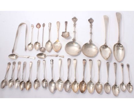 Selection of miscellaneous silver flatware, including teaspoons, pair serving spoons, two table spoons, caddy spoon, pair sug