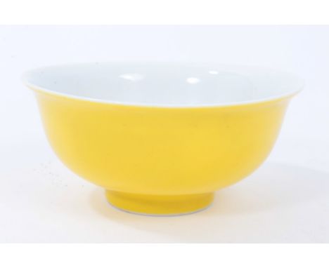 Chinese monochrome yellow glazed porcelain tea bowl, the interior white, with flared rim, six-character mark in underglaze bl