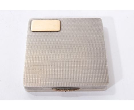 Good quality 1940's silver compact of rectangular form, with engine turned decoration and gilt metal applique, (Birmingham 19
