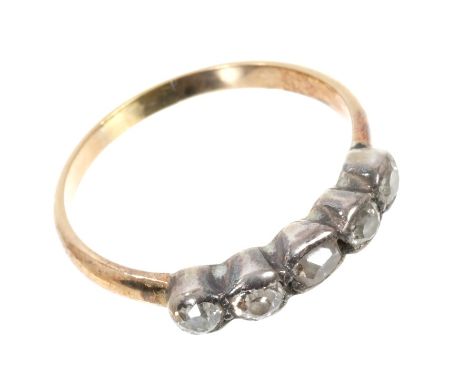 Antique diamond five stone ring with five old mine cut diamonds in silver collet setting on gold shank. Finger size Q.