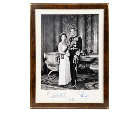 H.M. Queen Elizabeth II and H.R.H The Duke of Edinburgh, signed presentation portrait photograph signed in ink on mount 'Eliz