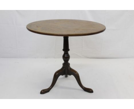 George III mahogany occasional table, circular tilt top on turned column and tripod cabriole legs with pad feet, 60cm diamete