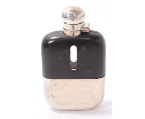 George V glass spirit flask with leather covered shoulder, silver hinged cover, with bayonet fastening and removeable silver 