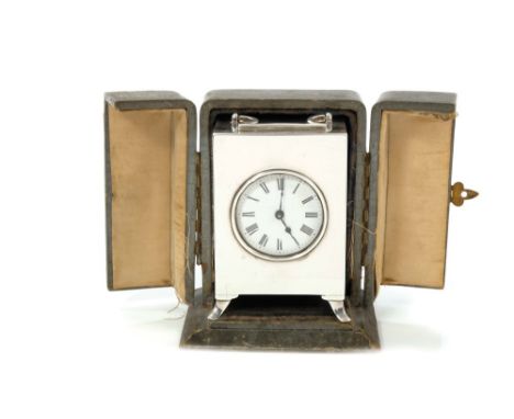 1920s Silver cased Carriage clock, with lever escapement and circular white enamel dial with Roman numerals, in original leat