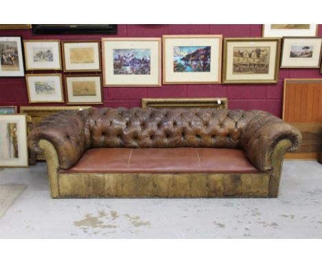 Antique leather chesterfield sofa of large size, button upholstered scrolled back, approximately 240c,m long