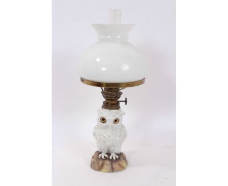 19th century Continental porcelain oil lamp, with opaline glass shade raised on Sitzendorf porcelain owl column, 37cm high