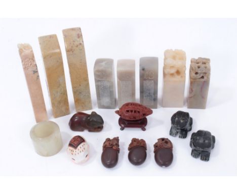 Group of Chinese hardstone seals, jade archer’s ring and other stone and nut carvings