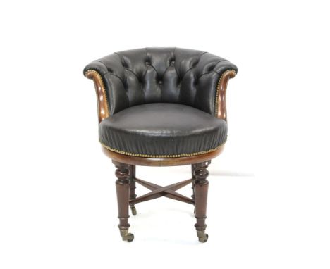 19th century desk tub chair, close-stud and button upholstered tub seat revolving on turned legs united by an x-stretcher wit