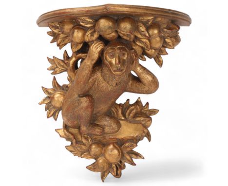 A carved giltwood shelf bracket, supported by a monkey, height 36cmGood condition, no damage 