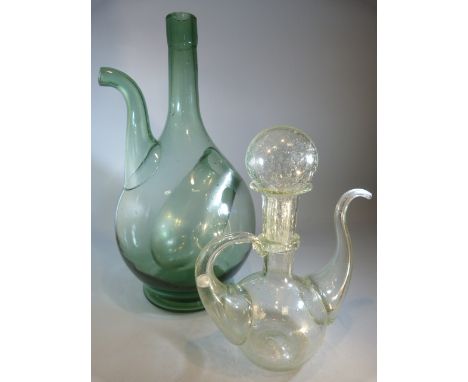 Green glass wine decanter with ice recess along with a clear 'bubble' glass oil pourer with stopper