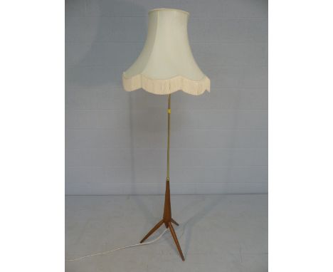 Mid Century 'bullet' style lamp on tripod feet.