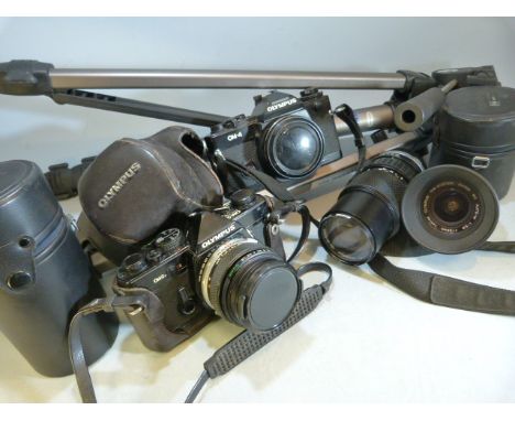 Selection of vintage cameras to include olympus, tripod and various lenses