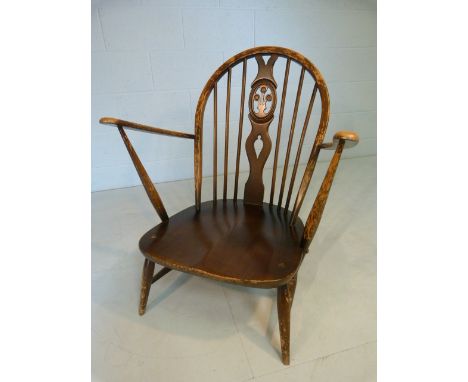 Ercol spindle back nursing chair with Prince of Wales Motif
