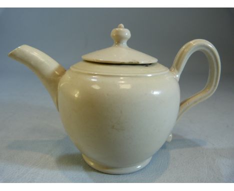 Creamware miniature teapot and cover. Large loop handle. Damage to underside of cover